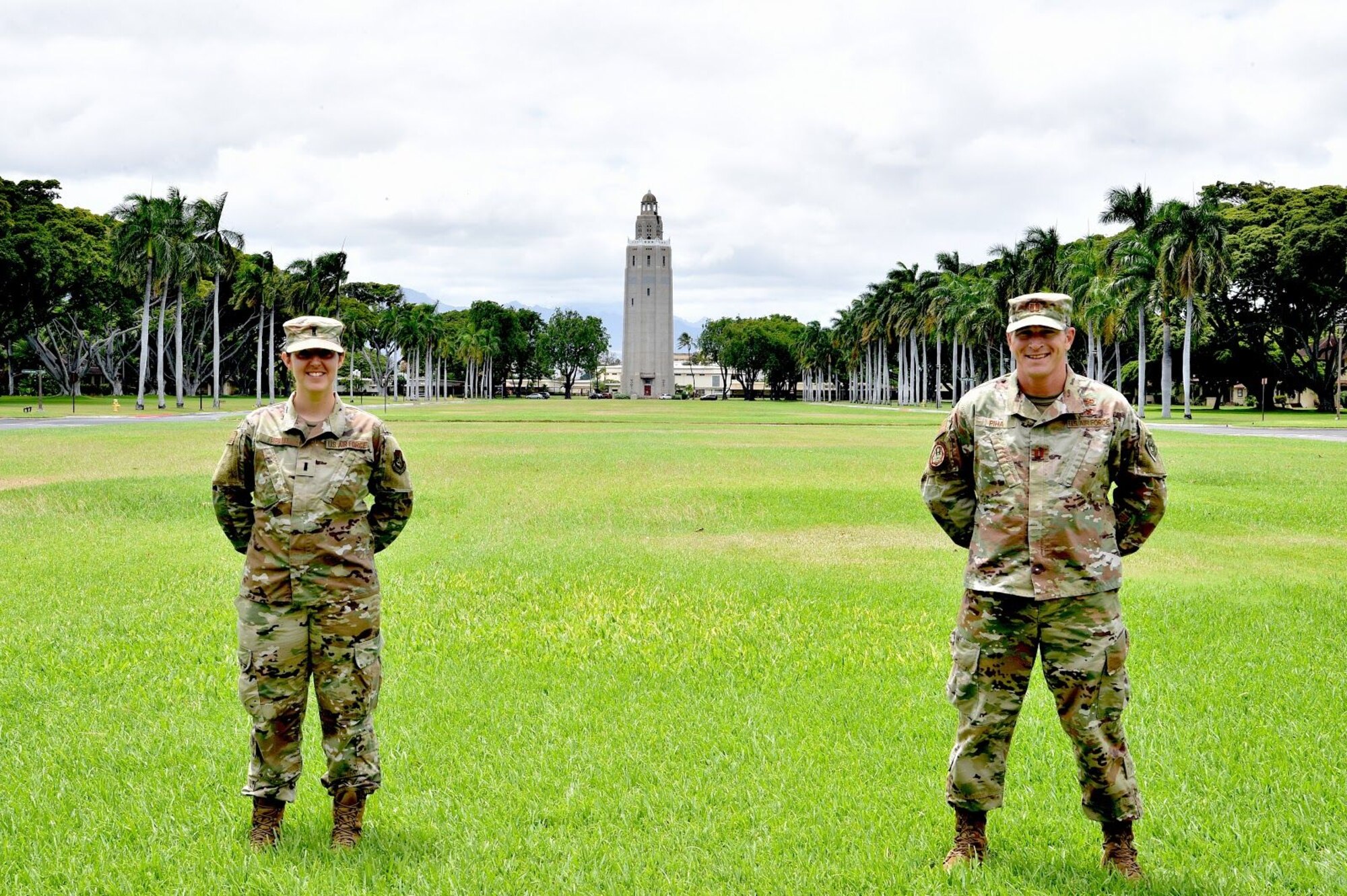 First Lt. Arielle Heald, 15th Wing Legal Office assistant staff advocate, and Capt. Christopher Piha, Pacific Air Forces weapons system support branch chief, along with U.S. Army Spc. Cantrell, not pictured, rendered first aid to a Honolulu Police officer who was involved in a motorcycle crash at Joint Base Pearl Harbor-Hickam, Hawaii, July 9, 2020. The officer is recovering from her injuries. (U.S. Air Force photo by 2nd Lt. Benjamin Aronson)