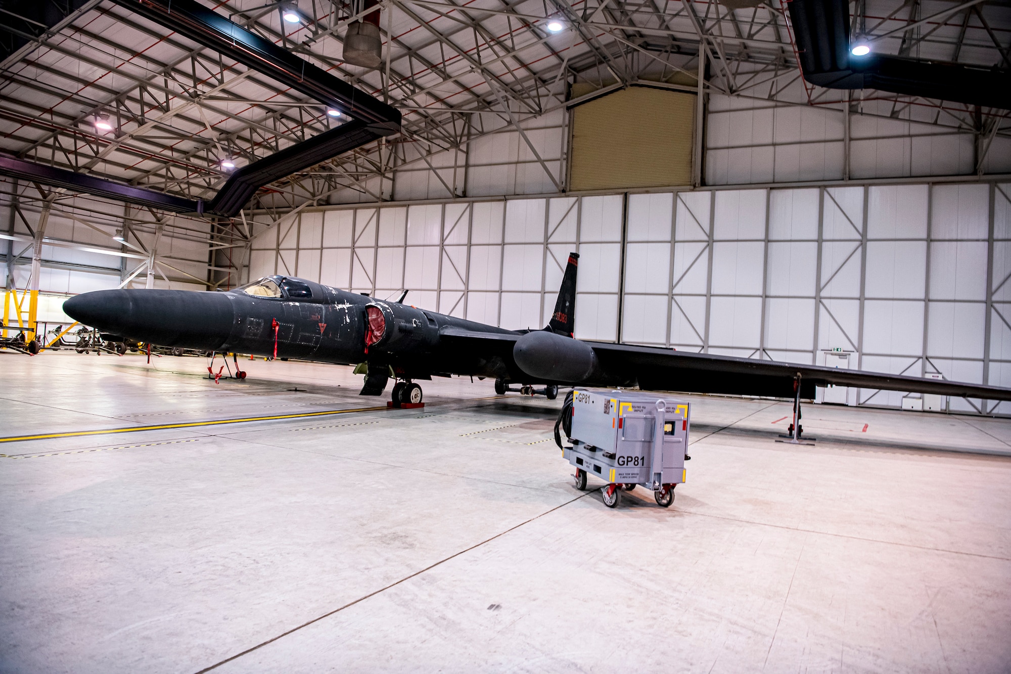 A U-2 Dragon Lady rests in a hangar at RAF Fairford, England, July 7, 2020. The U-2 aircraft assigned to the 9th Reconnaissance Wing, Beale Air Force Base, Calif., are currently deployed to RAF Fairford as part of the 99th Expeditionary Reconnaissance Squadron. The aircraft supplements a variety of missions that enhance regional and global security in support of U.S. and NATO allies and regional partners. (U.S. Air Force photo by Senior Airman Eugene Oliver)