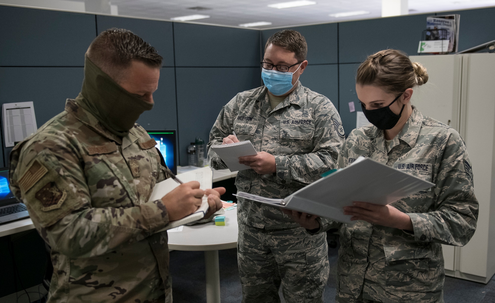 Master Sgt. Nathan Sigars, 419th Inspector General superintendent, reviews notes with personnel from the Education and Training Flight during a no-notice inspection