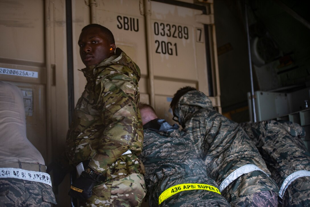Dover AFB continues its rapid global airlift mission, even during the extreme conditions of Tropical Storm Fay.