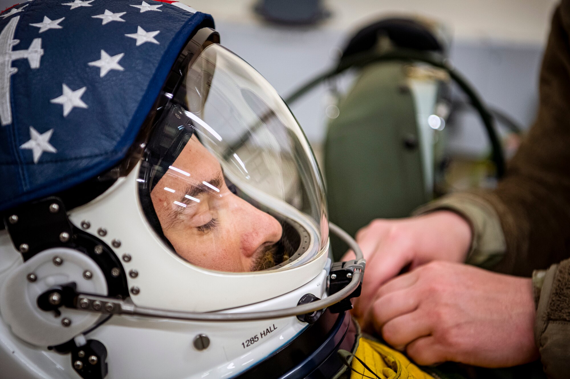 U.S. Air Force Capt. Joshua Hall, left, 99th Reconnaissance Squadron U-2 Dragon Lady pilot, receives suit preparations at RAF Fairford, England, July 8, 2020. The U-2 aircraft assigned to the 9th Reconnaissance Wing, Beale Air Force Base, Calif., are currently deployed to RAF Fairford as part of the 99th Expeditionary Reconnaissance Squadron. The aircraft supplements a variety of missions that enhance regional and global security support in support of U.S. and NATO allies and regional partners. (U.S. Air Force photo by Senior Airman Eugene Oliver)