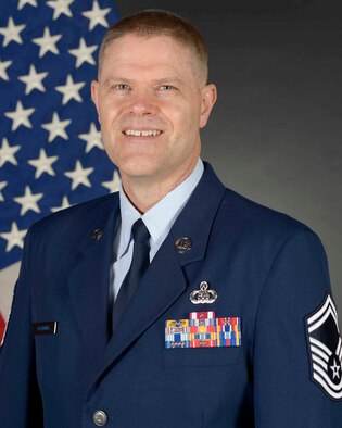 Official Photo of SMSgt David Hartung, Administrative Superintendent for the Band of the Pacific at Yokota Air Base, Japan and JB Hickam, Hawaii.
