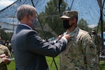 Tennessee Gov. Bill Lee presents Sgt. 1st Class Patrick Shields with The Soldier's Medal July 10, in Brownsville. Shields, a member of the Tennessee National Guard's 1175th Transportation Company, acted heroically in October 2018 when he disarmed and restrained a shooter after shots were fired in a parking lot following a high school football game.
