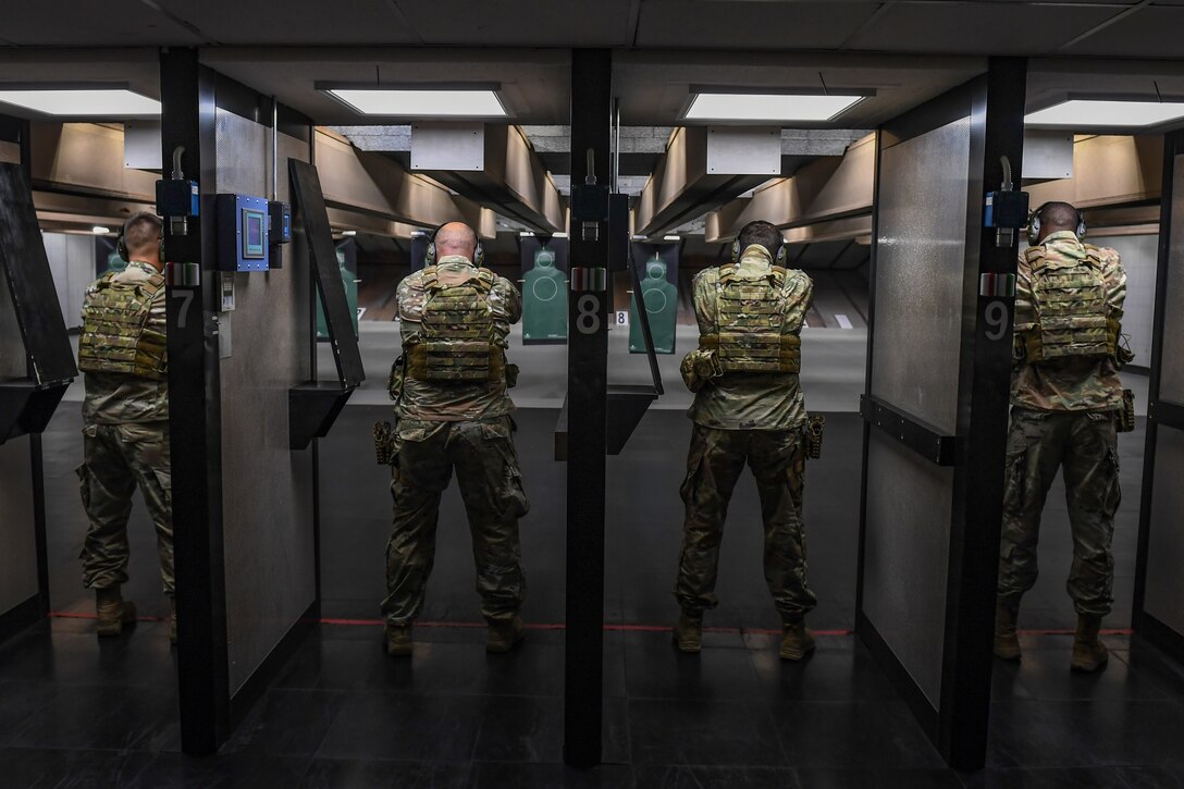 Airmen with the 31st Fighter Wing shoot at targets during a Combat Arms training and Maintenance class at Aviano Air Base, Italy, July 14, 2020. The Air Force Security Forces Center, in partnership with the Air Force Small Arms Program Office, began fielding the M18 handgun to security forces units. This transition was part of the Reconstitute Defender Initiative which aims to modernize weapon systems and increase warfighter lethality. (U.S. Air Force photo by Airman 1st Class Thomas S. Keisler IV)