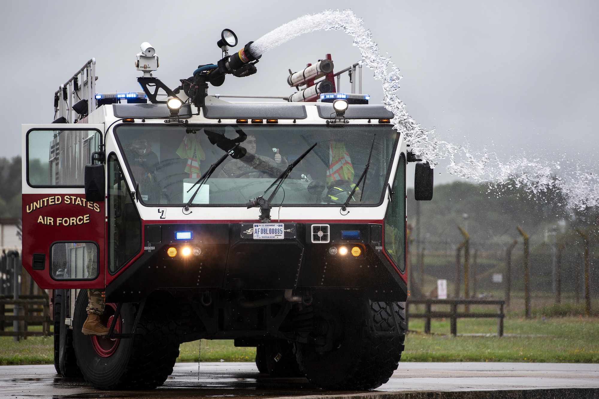 U.S. Air Force firefighters assigned to the 48th Civil Engineering Squadron conduct a controlled burn training exercise at Royal Air Force Lakenheath, England, July 8, 2020. Liberty Wing firefighters participate in live fire and smoke training quarterly to ensure readiness for real-world situations. (U.S. Air Force photo by Airman 1st Class Jessi Monte)