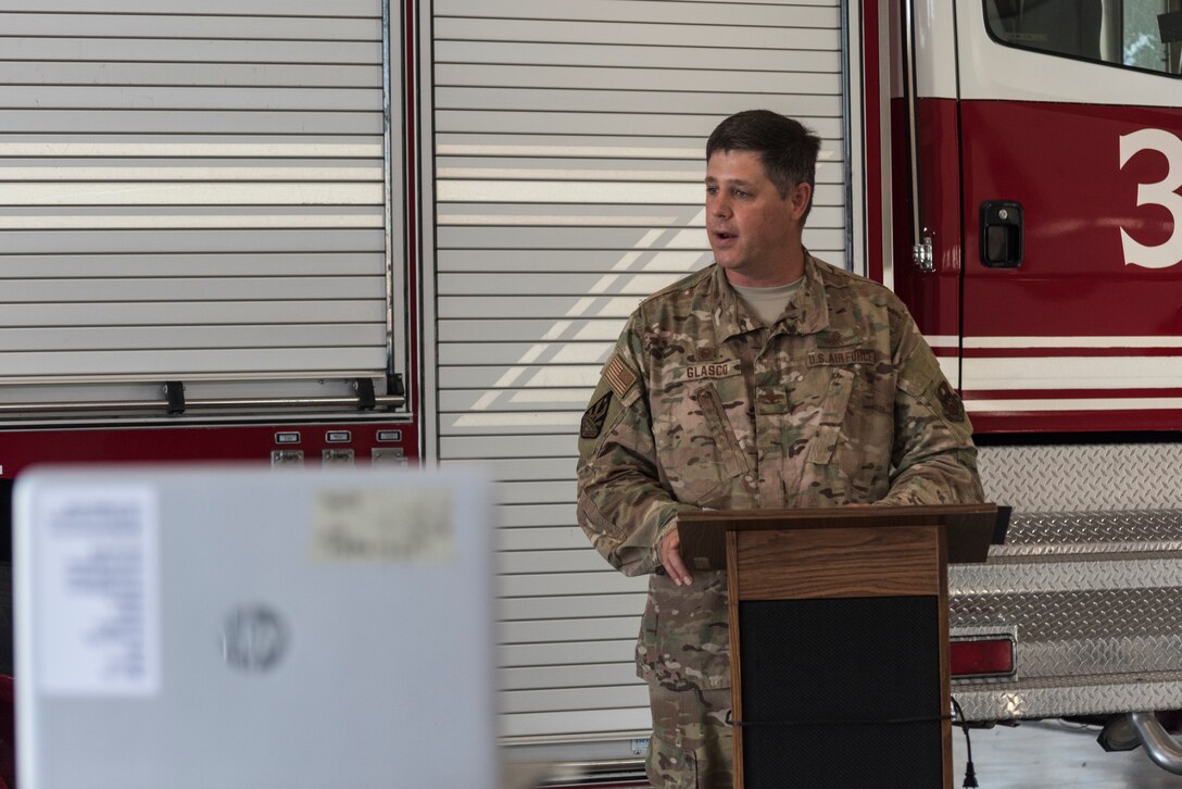 Col. Ted Glasco, 47th Mission Support Group commander, welcomes Lt. Col. Marc Johansen to Team XL as the 47th Civil Engineer Squadron at the assumption of command on July 13, 2020 at Laughlin Air Force Base, Texas. The ceremony was held at the firehouse with 10 in attendance, all who wore masks and practiced social distancing. The rest of the squadron and families tuned in through Facebook Live. (U.S. Air Force photo by Senior Airman Anne McCready)
