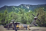 Aviators assigned to the New York Army National Guard's Army Aviation Support Facility #3, from Latham, N.Y., along with forest rangers and environmental conservation officers, scout locations for landing zones around Whiteface Mountain near Lake Placid, N.Y., July 6, 2020. The pilots are looking at using the rocky outcrops of the mountain to train with UH-60 Black Hawks helicopters.