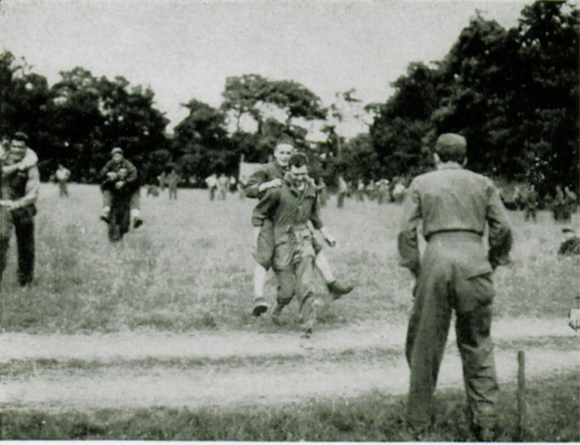 A piggy back race was part of the sports activities at the group’s first birthday celebration at ALG A-6 near Sainte-Mère-Église.  (The Story of the 371st Fighter Group in the E.T.O.)