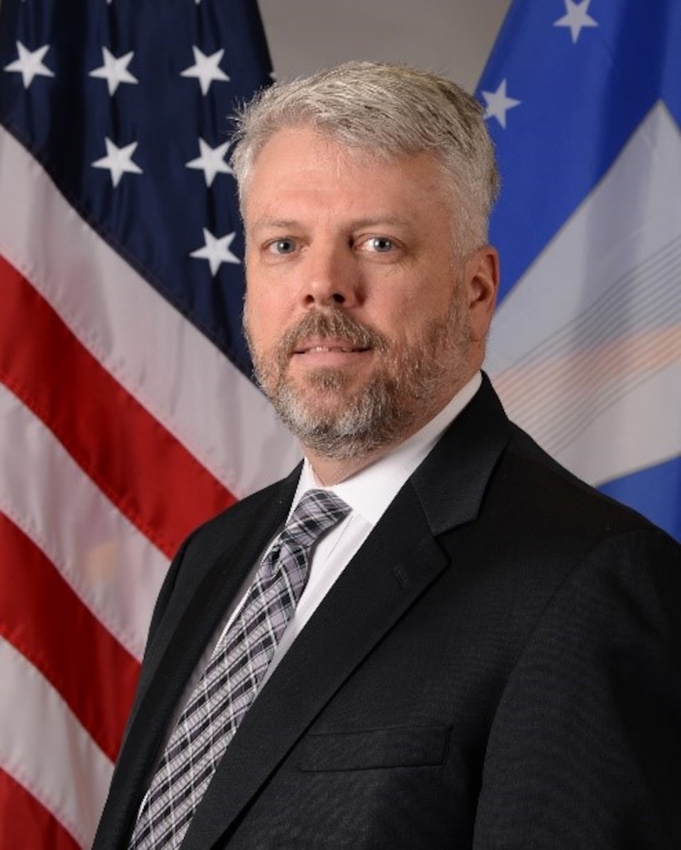 This is the official portrait of Kenneth M. Brennan.