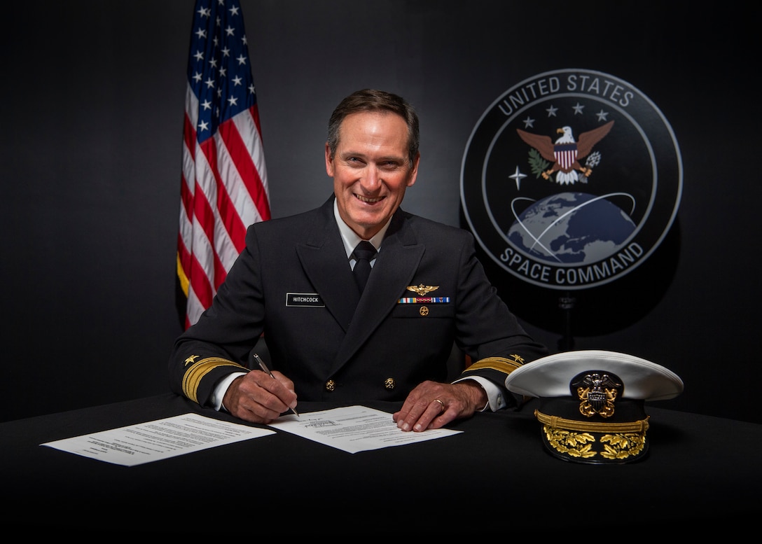 Rear Adm. Marcus A. Hitchcock, USSPACECOM Director of Strategy, Plans and Policy, signs a space data sharing Memorandum of Understanding between the United States and the Portuguese Republic recently at Peterson Air Force Base, Colorado.