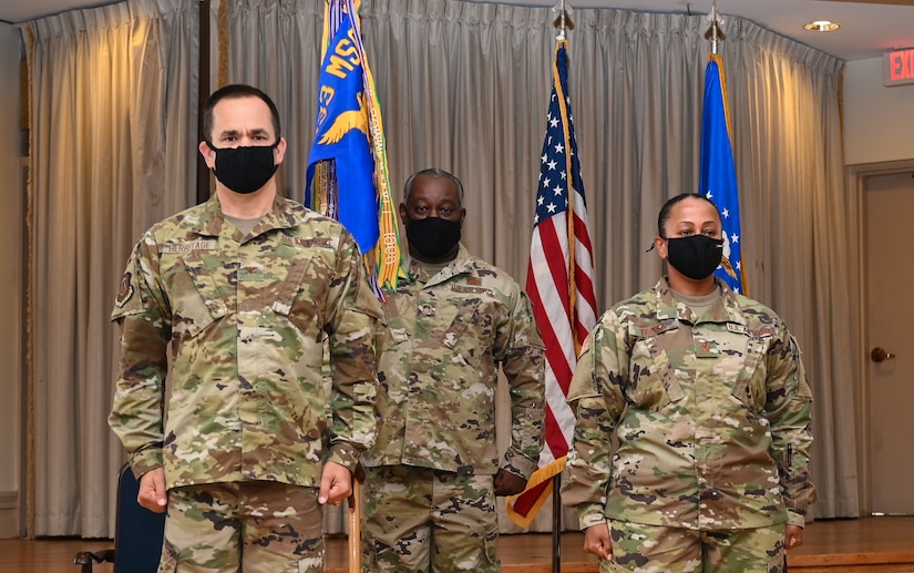 U.S. Air Force Major Lidia Iyassu, 633rd Security Forces Squadron commander, listens to final comments after assuming command of the 633rd SFS at Joint Base Langley-Eustis, Virginia, July 15, 2020. Members of the official party and guests wore masks and observed social distancing throughout the ceremony. (U.S. Air Force photo by Airman 1st Class Sarah Dowe)