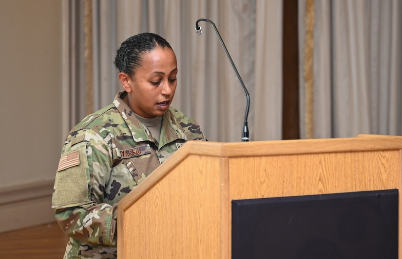 U.S. Air Force Major Lidia Iyassu, 633rd Security Forces Squadron commander, gives comments after she assumed command of the 633rd SFS at Joint Base Langley-Eustis, Virginia, July 15, 2020. Iyassu previously commanded the SFS squadron at Barksdale Air Force Base, Louisiana. (U.S. Air Force photo by Airman 1st Class Sarah Dowe)