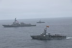USS Halsey performs a passing exercise with the Ecuadorian Navy.