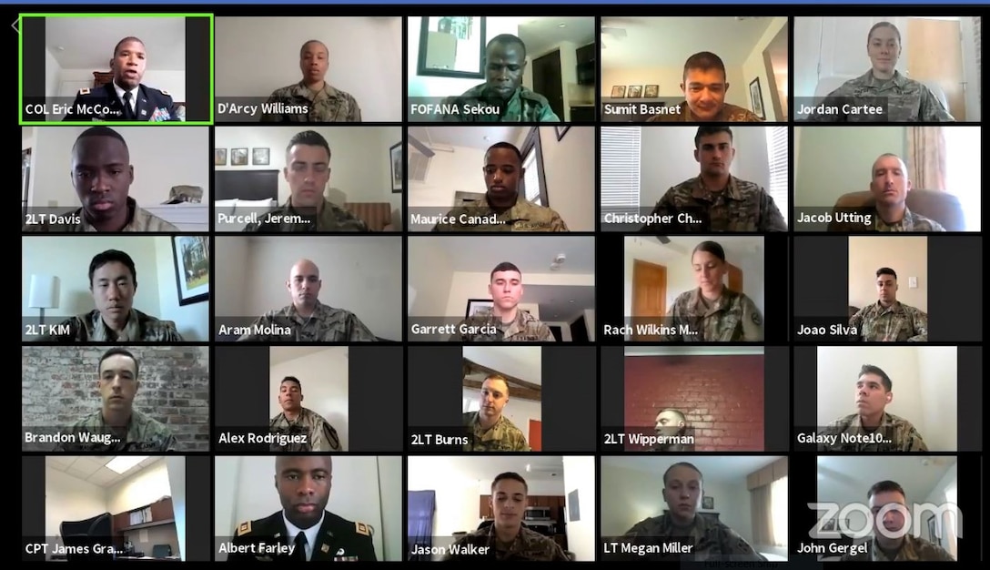 Army Soldiers participate in a Zoom virtual graduation ceremony.