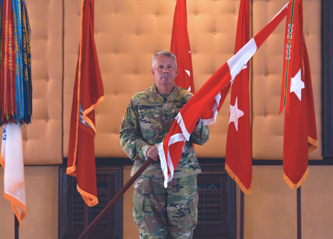 LTG Semonite passes the division flag to BG Tickner.