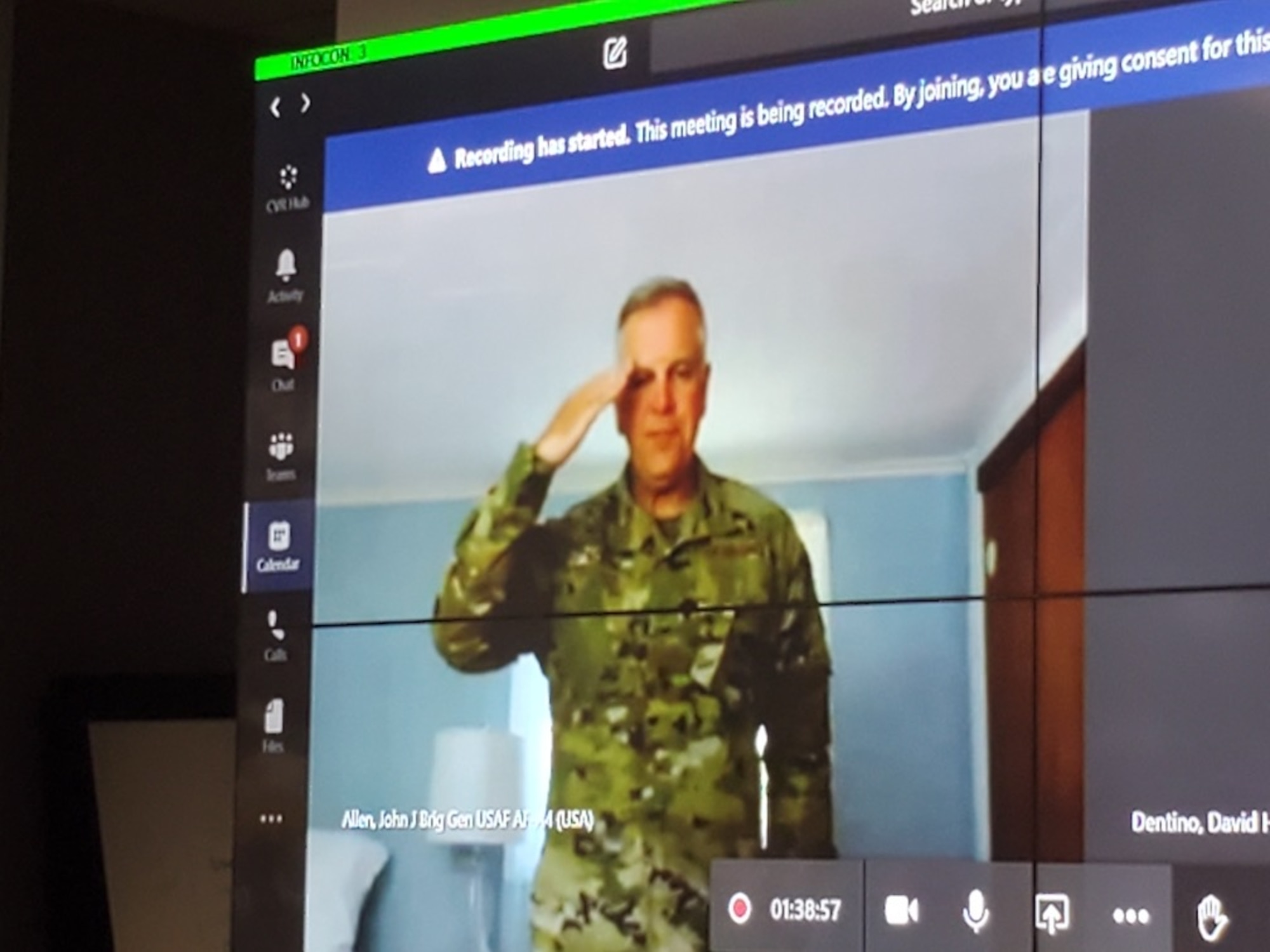 photo of Brig. Gen. John Allen saluting