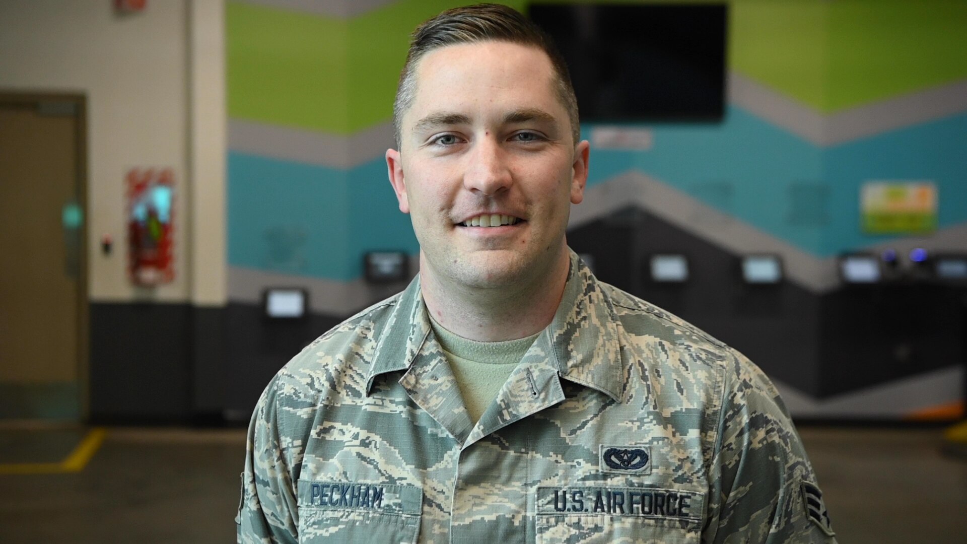 Oklahoma Air National Guard Senior Airman Kaleb Peckham, a water and fuels systems maintainer with the 137th Special Operations Civil Engineering Squadron, poses for a photo at the Regional Food Bank of Oklahoma in Oklahoma City, April 24, 2020. He worked for weeks at the Food Bank before transitioning to other needed tasks within Oklahoma during the state's whole-of-government response to COVID-19. (Oklahoma Air National Guard photo by Staff Sgt. Jordan Martin)