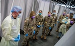 Lt. Gen. Laura Richardson (second from left), commander of U.S. Army North, views the patient area of the intensive care unit at the Javits New York Medical Station, April 12, 2020.