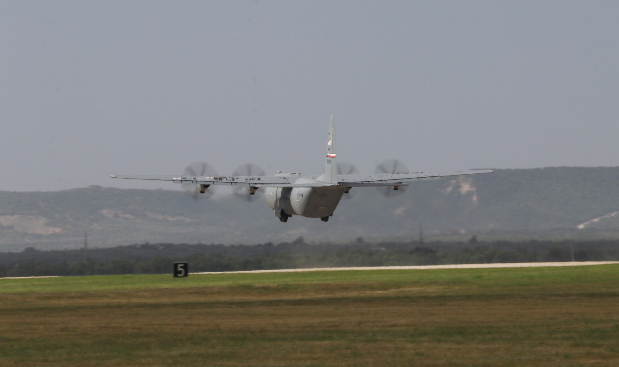 A C-130J Super Hercules aircraft from the 317th Airlift Wing takes off during a Joint Forcible Entry at Dyess Air Force Base, Texas, July 14, 2020.