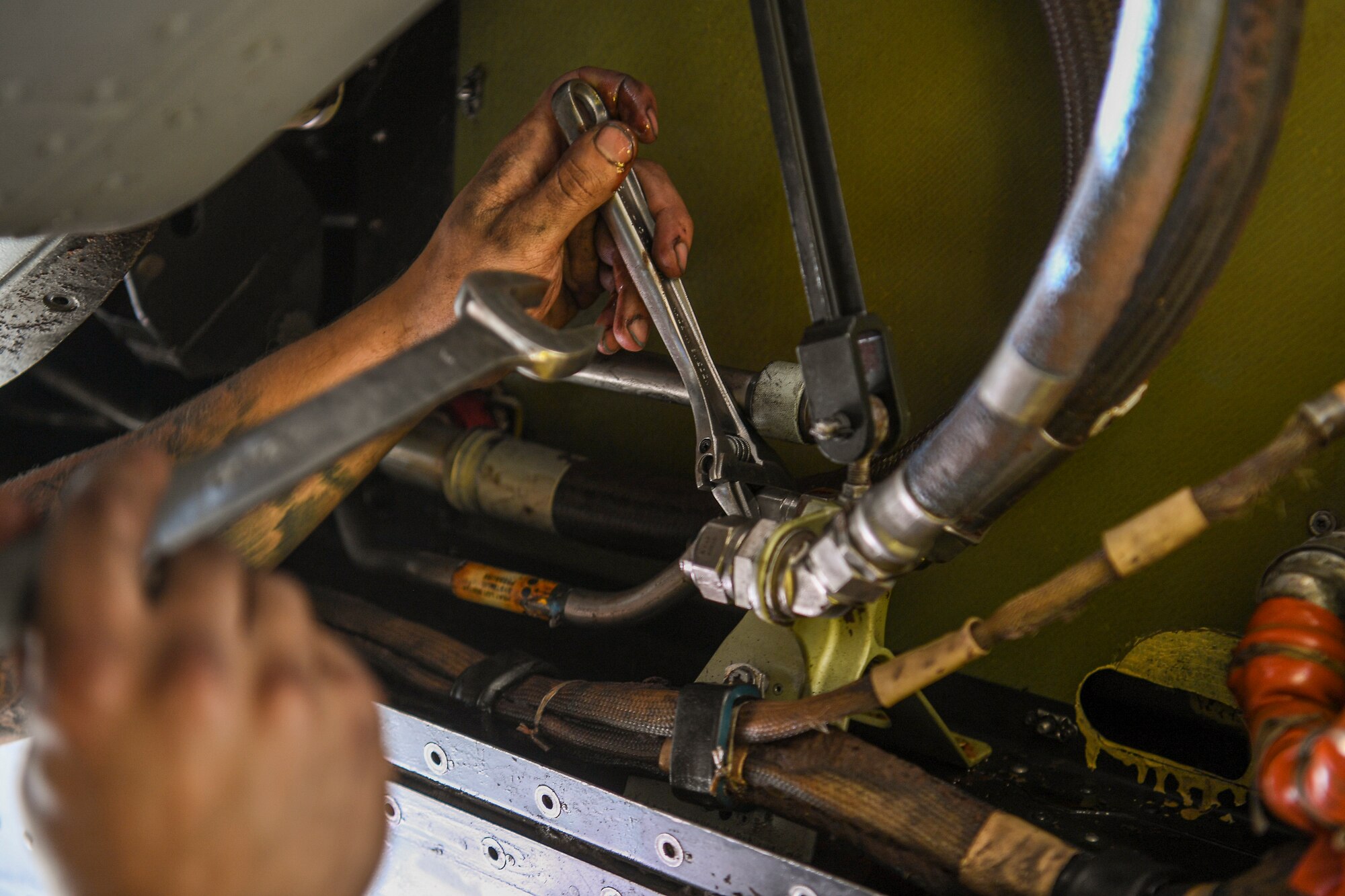 Maintainer works on a CV-22 Osprey.