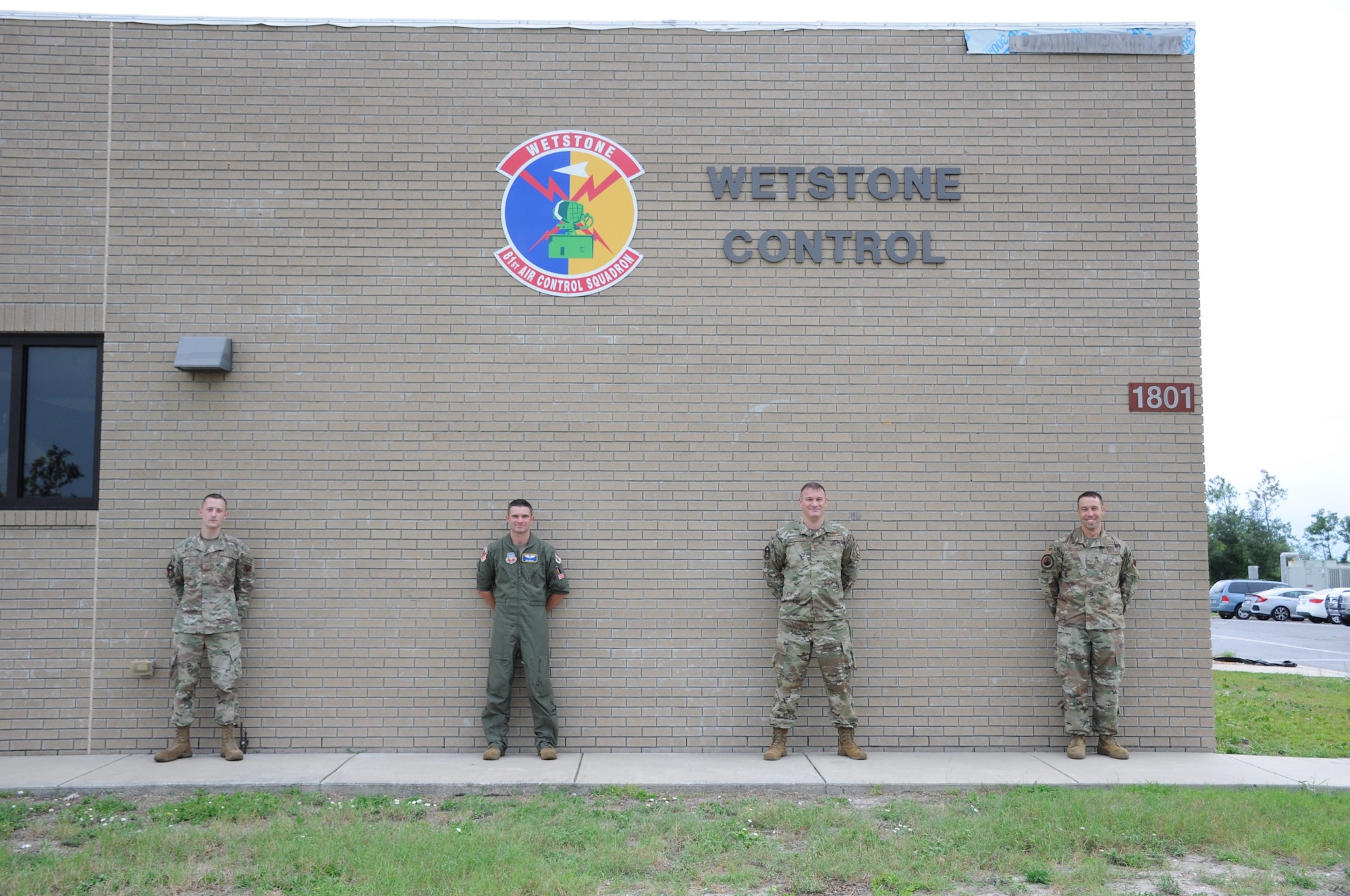 people standing in front of building