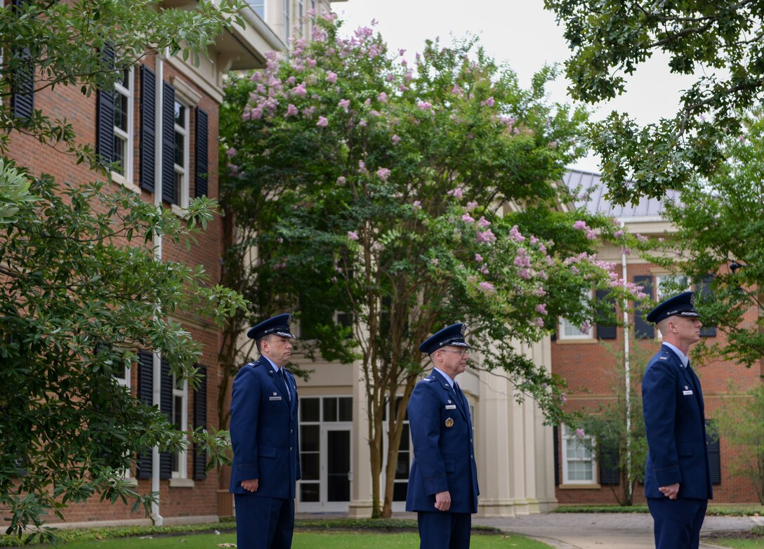 Col. Seth Graham (right), 14th Flying Training Wing commander, Ret. Col. Gary Hayward (center), former 14th Mission Support Group commander, and Col. Jeffrey Welborn (left), 14th MSG commander, stand at attention before the 14th MSG change of command ceremony on July 13, 2020, at Columbus Air Force Base, Miss. Hayward served as commander of the 14th MSG from August 2018 to July 2020. (U.S. Air Force photo by Airman 1st Class Davis Donaldson)