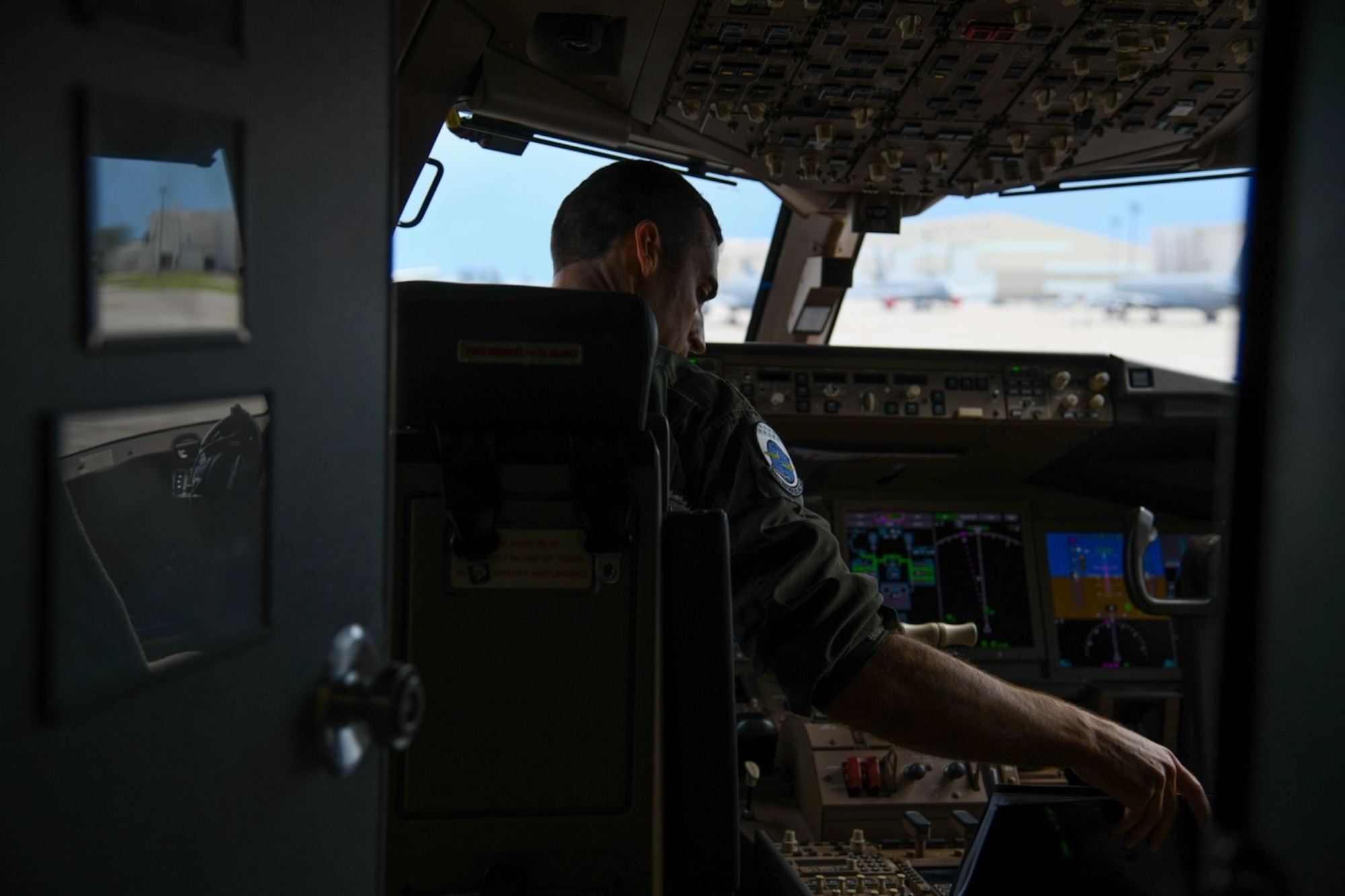 Maj. Michael Murphy, 905th Air Refueling Squadron pilot, conducts a preflight check July 9, 2020, at McConnell Air Force Base, Kansas. Murphy was part of a seven-man aircrew team that participated in a total force initiative to test capabilities of aeromedical evacuation on the KC-46A Pegasus. The mission marked the first aeromedical evacuation of live patients to be carried out by the KC-46. (U.S. Air Force photo by Airman 1st Class Nilsa Garcia)