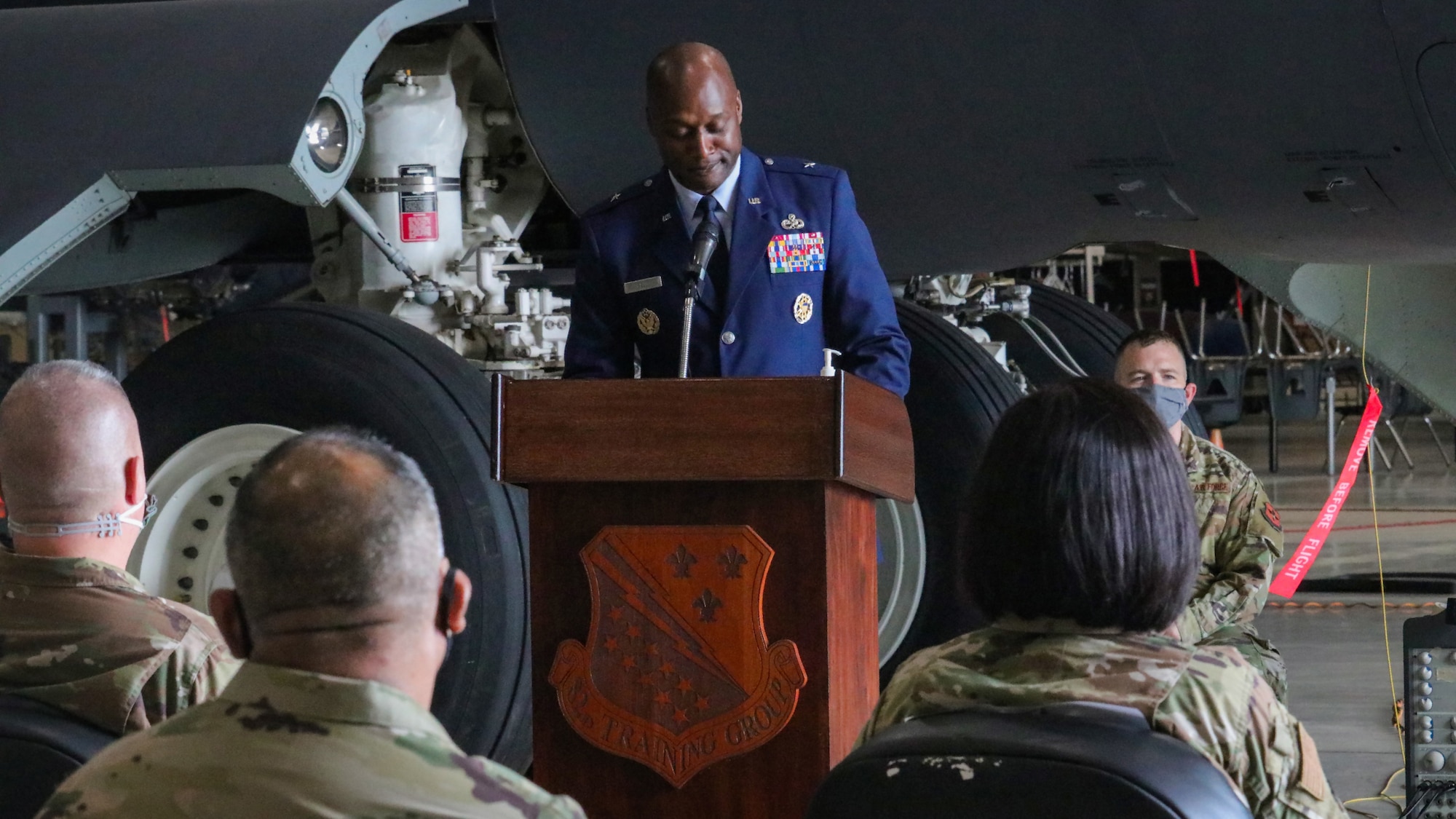 Brig. Gen. Kenyon Bell addresses audience at the 82nd Training Group change of command