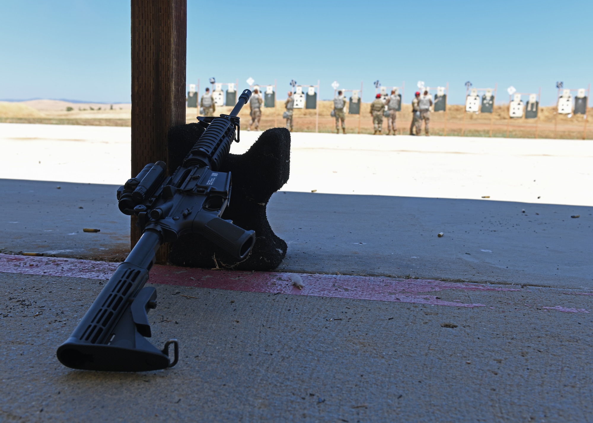 An M4 Carbine lays on a shooting rest during a Combat Arms Training and Maintenance (CATM) course, June 22, 2020, at Beale Air Force Base California. CATM instructors teach Airmen how to properly use, disassemble, and clean a weapon safely. (U.S. Air Force photo by Airman 1st Class Luis A. Ruiz-Vazquez)