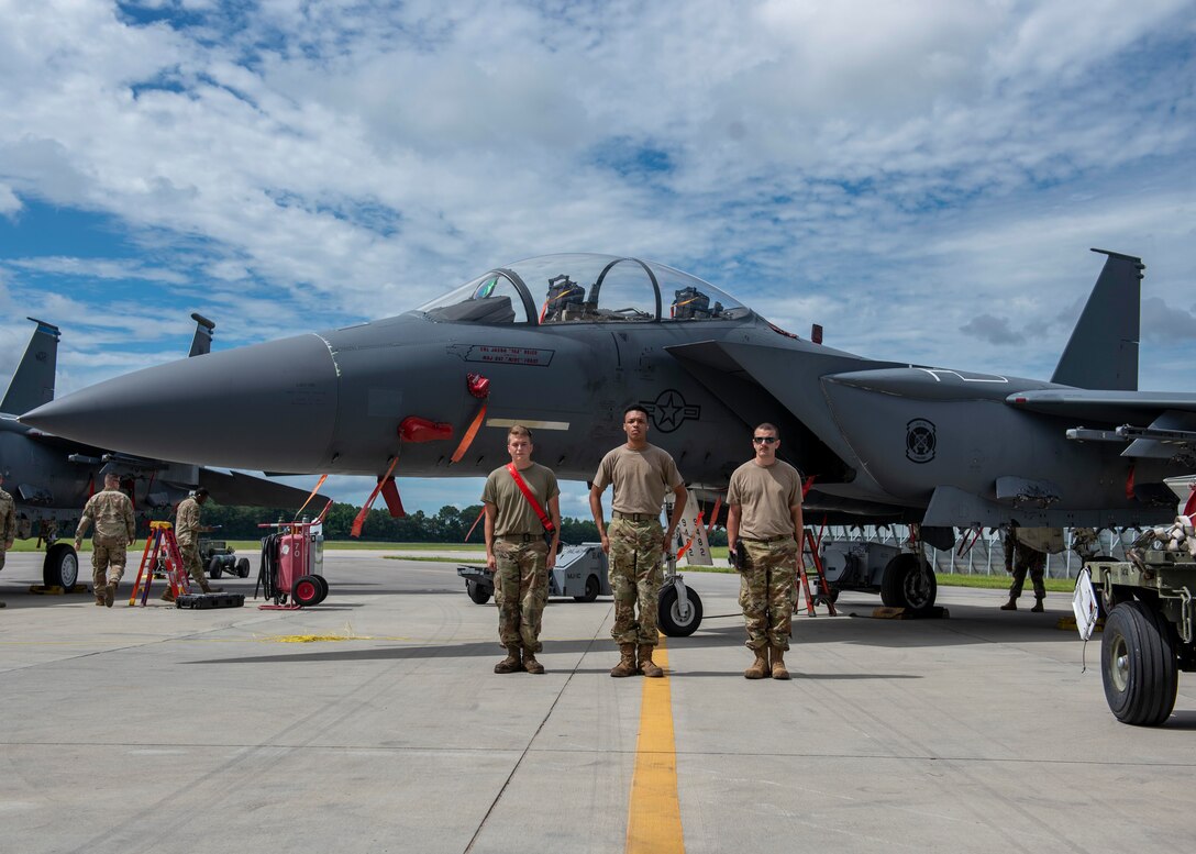 Weapons load crew Airmen from the 334th Aircraft Maintenance Unit await the start of the quarterly load crew competition at Seymour Johnson Air Force Base, North Carolina, July 10, 2020.