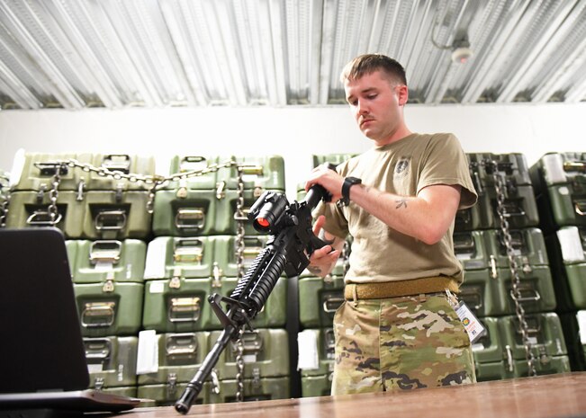 Senior Airman Richard Mitchell, 9th Security Forces Squadron combat arms instructor, inspects an M4 Carbine, June 23, 2020, at Beale Air Force Base California. Recce Town’s combat arms instructors conduct weapon inspections regularly to ensure weapons are in proper working condition. (U.S. Air Force photo by Airman 1st Class Luis A. Ruiz-Vazquez)