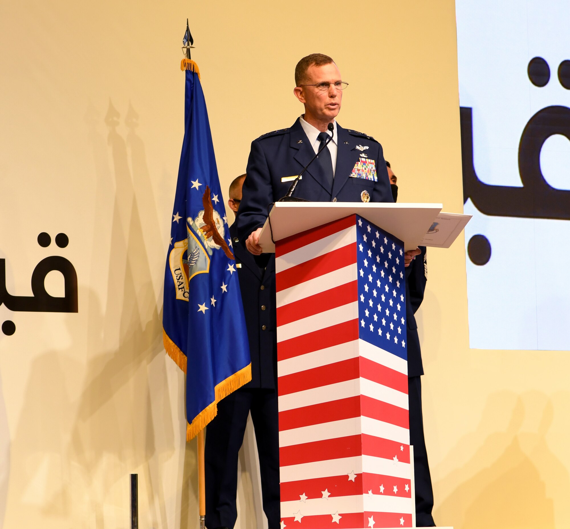 U.S. Air Force Lt. Gen. Gregory Guillot delivers remarks after becoming the commander of U.S. Air Forces Central Command and the combined forces air component commander during a change of command ceremony at Al Udeid Air Base, Qatar, July 16, 2020