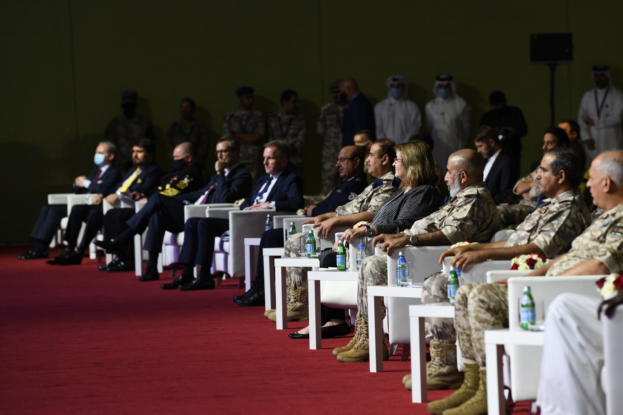 Distinguished guests sit in the front row during the U.S. Air Forces Central Command change of command ceremony at Al Udeid Air Base, Qatar, July 16, 2020.