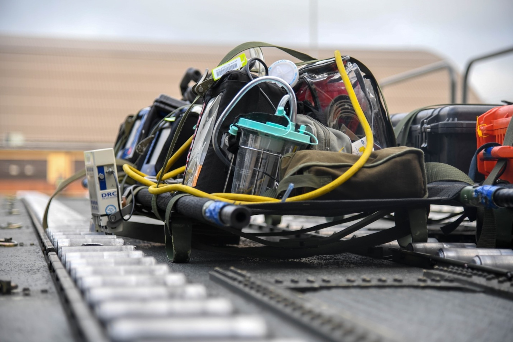 A litter containing in-flight medical equipment sits on a cargo-loader prior to being loaded onto a KC-46A Pegasus July 10, 2020, at Joint Base Andrews, Maryland. The total-force mission demonstrated the aircrafts versatility in conducting one of its three mission sets aerial refueling, airlift and aeromedical evacuation. (U.S. Air Force photo by Airman 1st Class Nilsa Garcia)