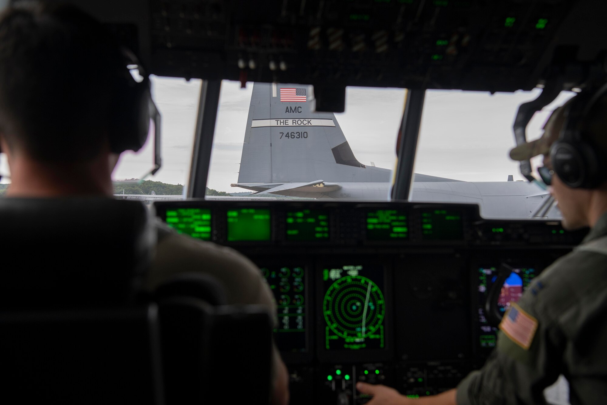 Pilots from the 41st Airlift Squadron perform pre-flight checks on a C-130J Super Hercules before takeoff during the Herk Nation Stampede at Little Rock Air Force Base, Arkansas, July 14, 2020.