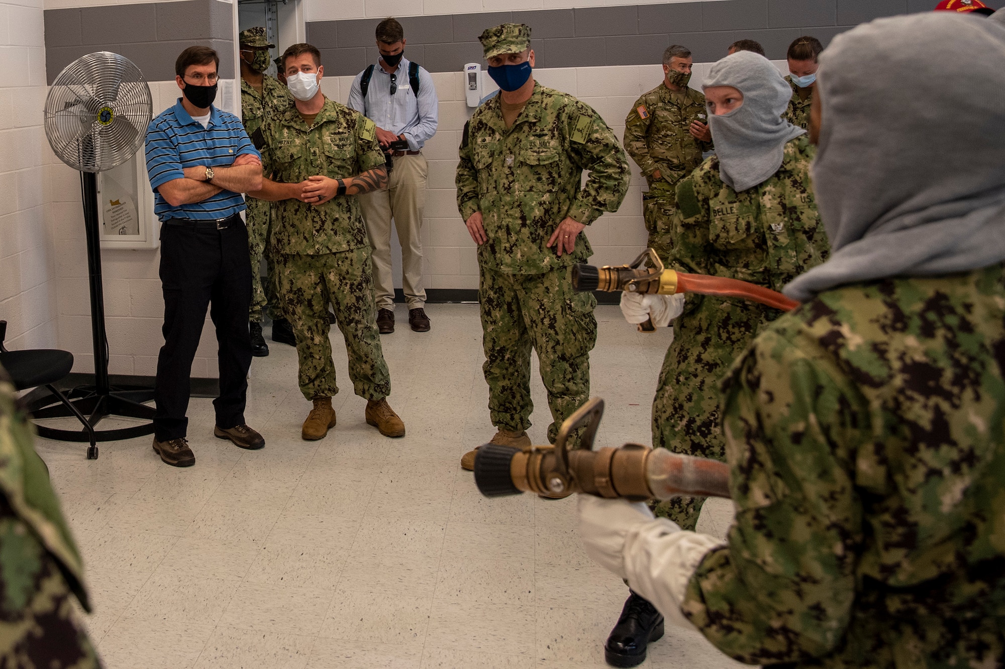 Secretary of Defense Mark T. Esper observes recruits