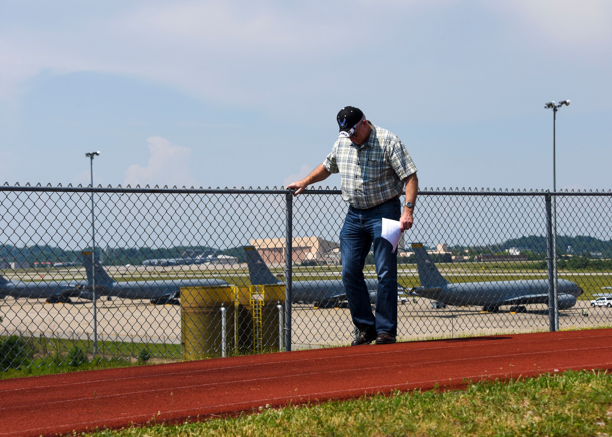 David Sparkman, Occupational Safety Manager, inspects the track at the 171st Air Refueling Wing July 9, 2020, Pittsburgh, Pa. Sparkman is looking for any issues with the track that would be a safety violation. (U.S. Air National Guard photo by Senior Airman Zoe M. Wockenfuss)