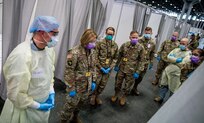 Lt. Gen. Laura Richardson (second from left), commander of U.S. Army North, views the patient area of the intensive care unit at the Javits New York Medical Station, April 12, 2020.