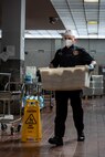 U.S. Marine Corps Sgt. James M. Canady, a food service specialist with Base Food Service, Marine Corps Installations Pacific, transfers sandwiches on Camp Kinser, Okinawa, Japan, July 13, 2020. MCIPAC base food services has created a full-time team of Marines that have prepared more than 30,000 boxed meals for restriction of movement (ROM) Marines across the entire island. Thousands more boxed meals are expected to be prepared in the coming weeks. (U.S. Marine Corps photo by Lance Cpl. Isaac Munce)