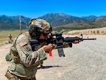 Staff Sgt. Wayne “Guido” Gray, California National Guard, engages targets in the Reflexive Fire match July 10, 2020, during the Marksmanship Advisory Council Region Seven Championships at Camp Williams, Bluffdale, Utah. Thirty-four Guard members from California, Colorado, Nebraska, Nevada, New Mexico and Utah spent three intense days in the mountains of Utah competing. Colorado took home the team championship title.