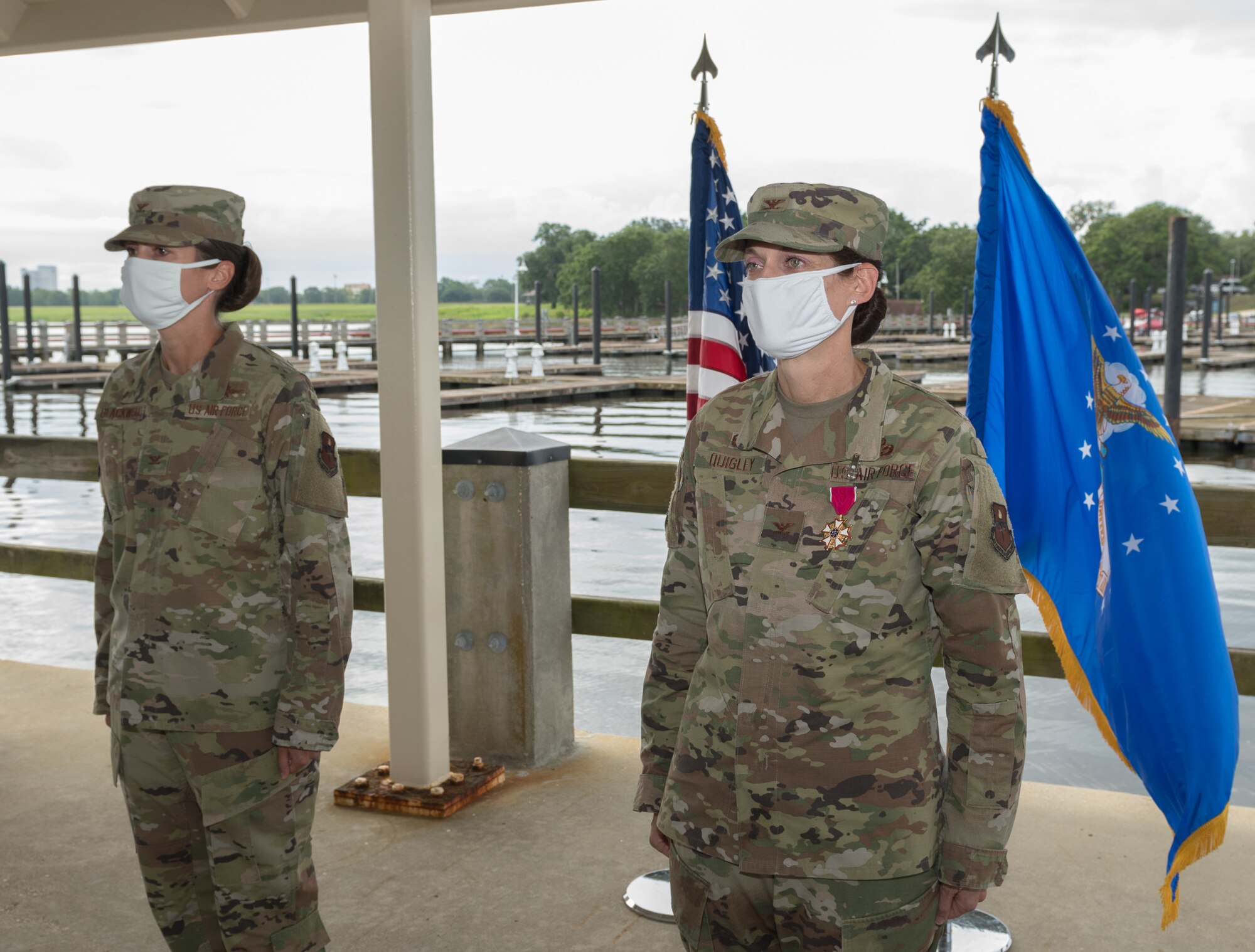 U.S Air Force Col. Heather Blackwell, 81st Training Wing commander, presented the Legion of Merit medal to
Col. Marcia Quigley, 81st Mission Support Group commander, during the 81st MSG change of command ceremony at the Marina Park at Keesler Air Force Base, Mississippi, July 16, 2020. The ceremony is a symbol of command being exchanged from one commander to the next by the handing-off of a ceremonial guidon. (U.S. Air Force Photo by Andre' Askew)