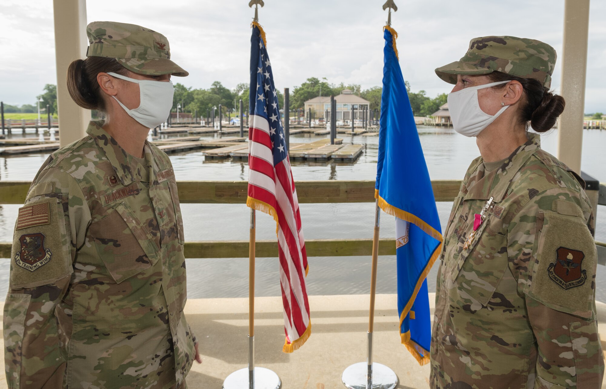 U.S Air Force Col. Heather Blackwell, 81st Training Wing commander, presented the Legion of Merit medal to
Col. Marcia Quigley, outgoing 81st Mission Support Group commander, during the 81st MSG change of command ceremony at the Marina Park at Keesler Air Force Base, Mississippi, July 16, 2020. The ceremony is a symbol of command being exchanged from one commander to the next by the handing-off of a ceremonial guidon. (U.S. Air Force Photo by Andre' Askew)