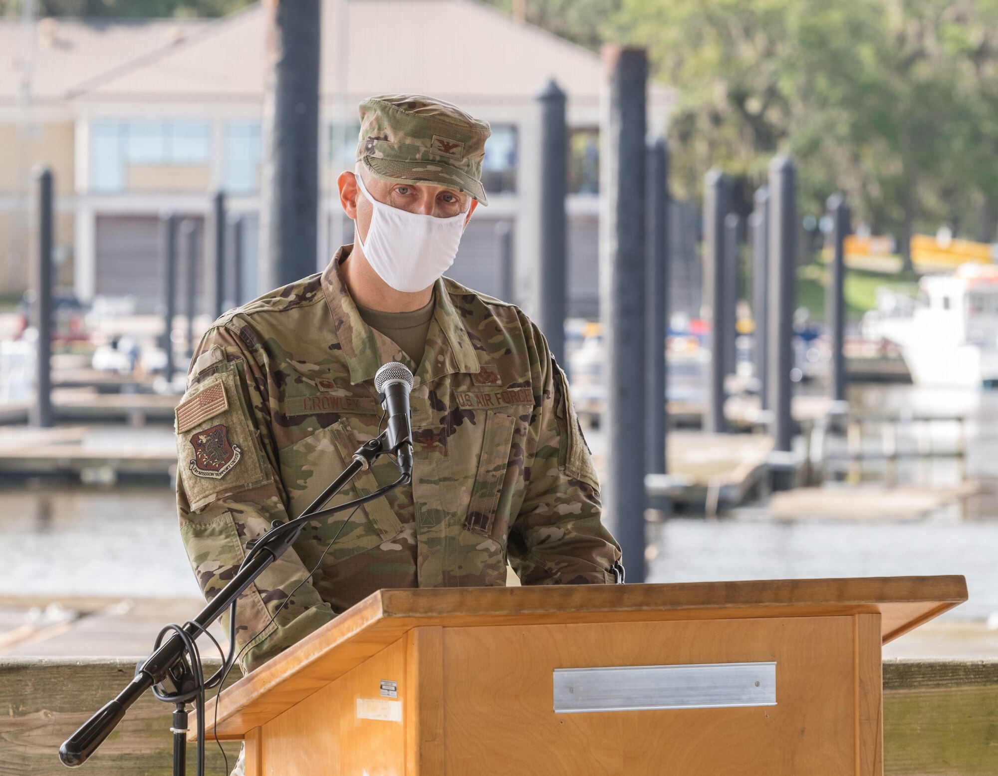 U.S Air Force Col. Ryan Crowley, incoming 81st Mission Support Group commander, addresses his new command during the 81st MSG change of command ceremony at the Marina Park at Keesler Air Force Base, Mississippi, July 16, 2020. The ceremony is a symbol of command being exchanged from one commander to the next by the handing-off of a ceremonial guidon. (U.S. Air Force Photo by Andre' Askew)
