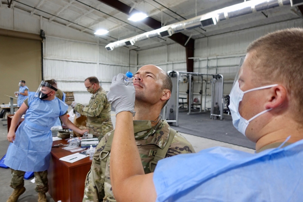 Soldiers receive COVID-19 tests.