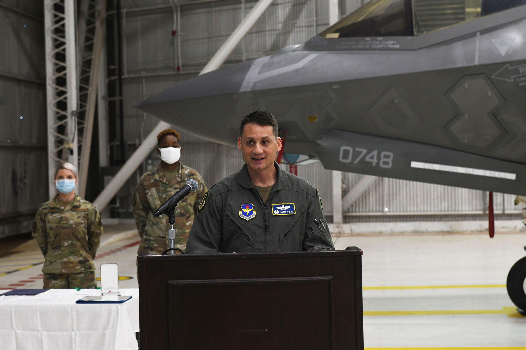 Air Force Col. Byron Pompa, incoming 33rd OG commander, addresses members of the 33rd OG, during the 33rd OG change of command at Eglin Air Force Base, Florida, July 17, 2020. The 33rd OG commander is responsible for leading a 390-person group comprised of the 33rd Operations Support Squadron, the 337th Air Control Squadron, two intelligence formal training units, and the 58th Fighter Squadron. (U.S. Air Force photo by Airman 1st Class Heather Leveille)