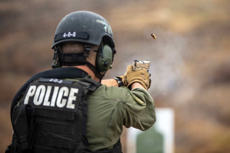U.S. Marine Cpl. Allen Waller, a marksman observer with the Special Reaction Team, Provost Marshal’s Office, Security and Emergency Services Battalion, Marine Corps Base Camp Pendleton, fires an M45A1 service pistol during a live-fire range at Range 221 on Camp Pendleton, California, June 17, 2020. During the range, SRT completed their monthly qualification with the M9A1 service pistol, the M45A1 service pistol, the M1014 semiautomatic shotgun, and the M4A1 carbine. (U.S. Marine Corps photo by Lance Cpl. Drake Nickels)