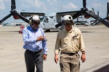 Charles A. Williams, Jr., assistant secretary of the Navy for Energy, Installations and Environment, looks out the back of a MV-22 Osprey during a tour of Marine Corps Base Camp Lejeune and Marine Corps Air Station New River, July 15, 2020. Williams visited MCB Camp Lejeune and MCAS New River to receive an update on military construction from installation leaders and view hurricane related repairs to facilities and family housing currently in progress. (U.S. Marine Corps photo by LCpl. Christian Ayers)