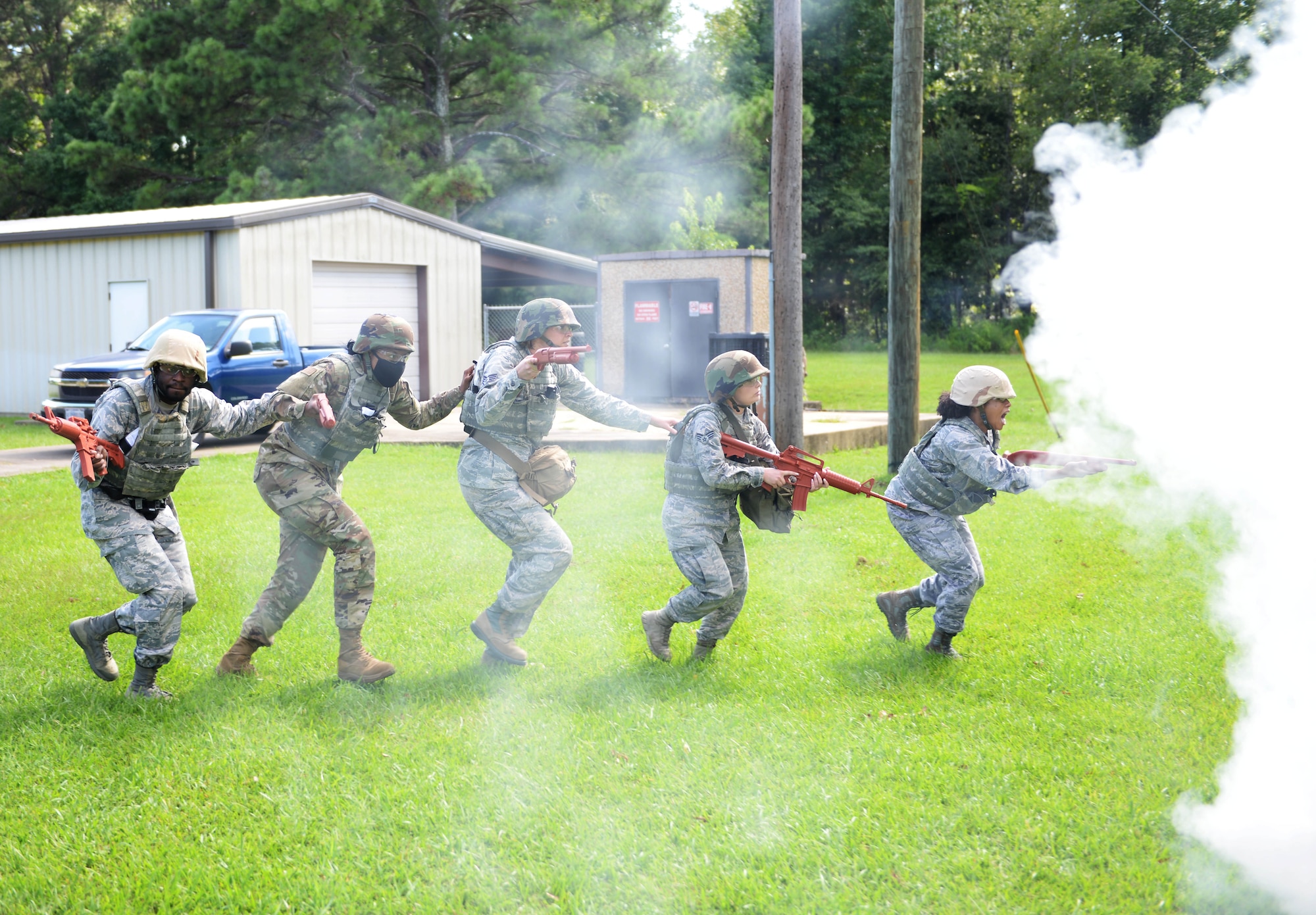 14th Medical Group Airmen use a line formation to get into the simulated battlefield during the Tactical Combat Casualty Care All Combatants course July 16, 2020, at the Kortiz Clinic on Columbus Air Force base, Miss. The 14th MDG held the Wing’s first on-site TCCC All Combatants course training 10 medics from Columbus AFB. (U.S. Air Force photo by Airman 1st Class Davis Donaldson)