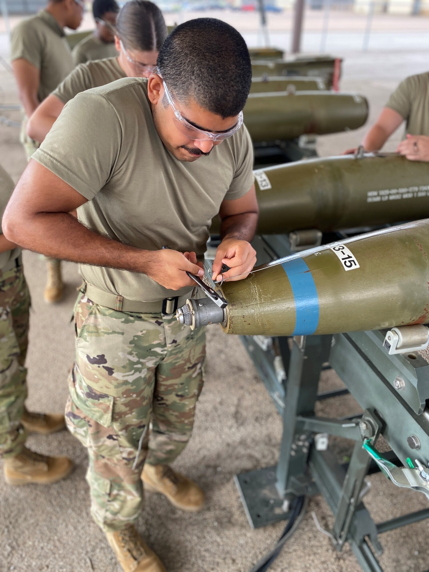 Airman 1st Class Jan Pabon, 363rd Training Squadron munitions system apprentice course student, assembles an MK82 training bomb at Sheppard Air Force Base, Texas, July 17, 2020. Pabon ACEd the munitions system apprentice course after scoring perfect scores on all seven of the course's block tests. (Courtesy Photo)