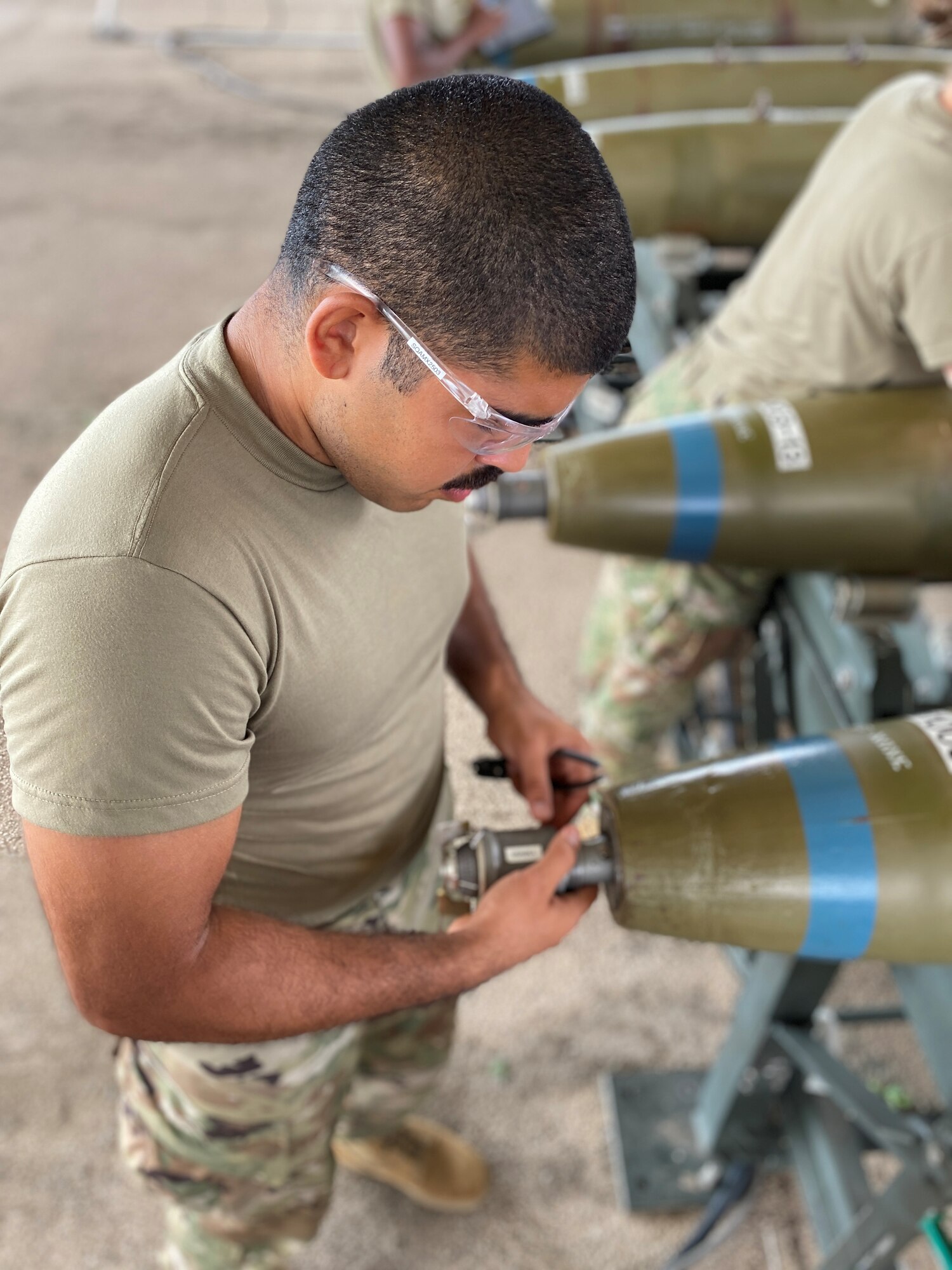 Airman 1st Class Jan Pabon, 363rd Training Squadron munitions system apprentice course student, assembles an MK82 training bomb at Sheppard Air Force Base, Texas, July 17, 2020. Pabon ACEd the munitions system apprentice course after scoring perfect scores on all seven of the course's block tests. (Courtesy Photo)